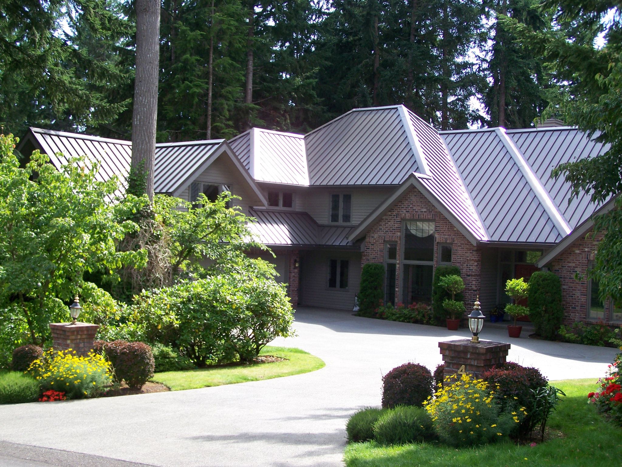 Beautiful standing seam metal roof installed by Blitz Roofing on a Pacific Northwest home near Lynnwood, WA